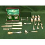 Set of 6 hallmarked silver tea spoons, pair silver napkin rings, cased silver knife rest, and