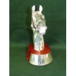 Hallmarked silver horses head on mahogany plinth 20 cm H