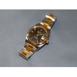 Steel and gold Rolex, Oyster Perpetual Date, Black dial, 2004, serial no Y140342, R15203330B7835.