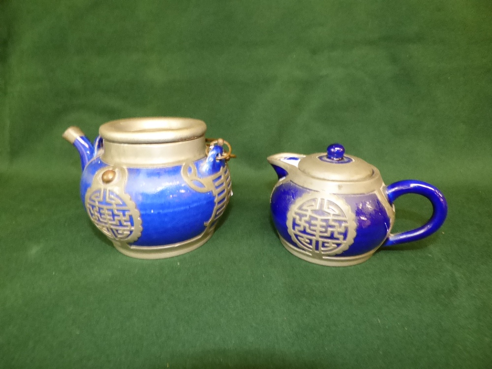 Chinese pottery metal mounted teapot and a smaller handled jug