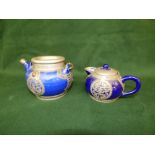 Chinese pottery metal mounted teapot and a smaller handled jug