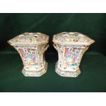 Pair of late C19th Cantonese Export famille rose flower pots in typical palette painted with figural