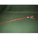 Early C20th African stick with swirling stem, and mask head terminal 82cm L