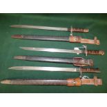 Three military bayonets dated 1913 with original scabbards