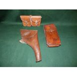 WW1 leather pistol holder, a dual leather ammunition holder and a leather cartridge holder (3)