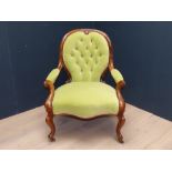 Victorian rosewood framed button backed armchair upholstered in lime green fabric