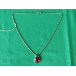 Silver 24" chain with faceted ruby pendant