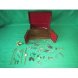 Teak wooden jewellery box with mixed costume jewellery and badges etc.