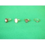 18ct gold ring and three mixed 9ct gold rings 7.9g