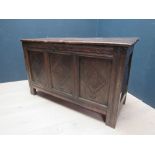 C18th oak coffer with planked top above three carved panels