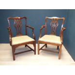 Two mixed Georgian mahogany arm chair with drop in seats