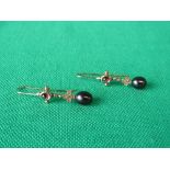 9ct gold drop hook earrings set with pink tourmaline, diamond and peacock pearls