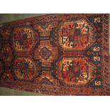 Shiraz runner, dark blue ground with elephant foot O'Hara design with ten medallions