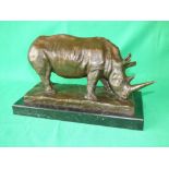 Bronze figure of a Rhino on marble base, 23Hx33cmW