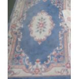 English blue ground rug with floral decoration 120x180 and curtain 105x140