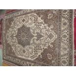 Hamadan carpet beige ground with stylised floral decoration in various tones of brown