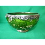 Green glass circular bowl with raised floral decoration signed Galle Nancy with decorative white