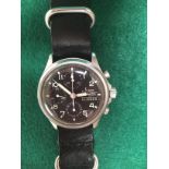 Sinn Flieger military style chronograph with black face and stainless steel case, with day and