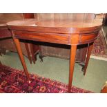 Regency mahogany foldover card table with green baize interior. 92cm W