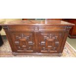 C17th style oak low two door cupboard 122W