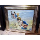 An impressionist oil painting of children at the seaside making sandcastles, signed, 49cm x 60cm