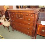Large mahogany Scottish chest of drawers flanked by rope twist columns. 130W x 124H