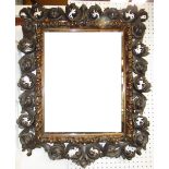 Pair of small oblong wall mirrors and a small foliat scrolling framed oblong wall mirror & 3 small