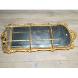 Good George III gilded arch top wall mirror with original glass and 3 shaped twist supported