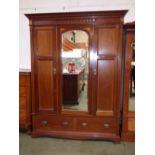 Edwardian inlaid mahogany triple wardrobe with mirrored door