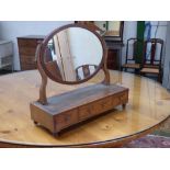 Regency inlaid mahogany oval toilet mirror on a 3 drawer base