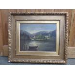 Oil on board, Continental lakeside scene with houses and mounteanous back ground in gilt frame