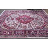 Good Tabriz carpet, red ground central cream panel within multi border 340 cm x 240 cm