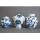Chinese blue and white stem bowl, cover and liner, flanked by twin lion mask handles, painted with