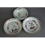 Pair of C18th Chinese famille rose dishes, each painted to the interior with ‘hundred antiques’