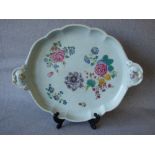 C18th Chinese porcelain famille rose tea service tray of lobed oval form, painted with floral spray,