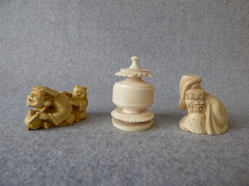 Two bone/bamboo netsukes and an ivory finial (3)