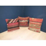 Three kilim cushions