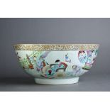 Large C18th Chinese famille rose bowl, painted to the exterior with various figures and a fenced