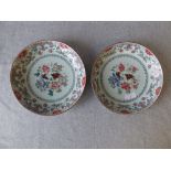 Pair of C18th Chinese famille rose circular dishes with birds & branches, 22cm diam