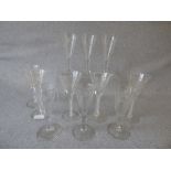 Group of 11 C18th style glasses, each with etched decoration