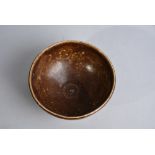 Chinese Jizhou russet-glazed bowl, Song Dynasty or later, 11cm diam.