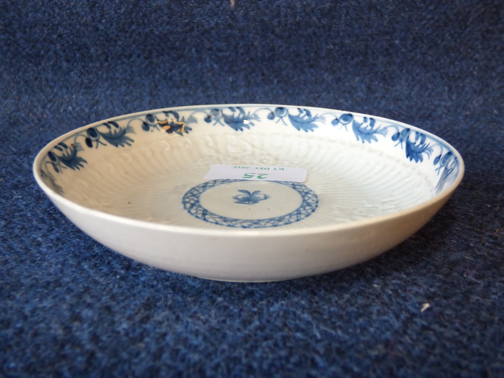 C18th Worcester blue & white saucer with moulded decoration (old collectors label)