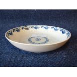 C18th Worcester blue & white saucer with moulded decoration (old collectors label)