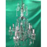 5 twin branch Chandelier, chrome supports, and glass drops