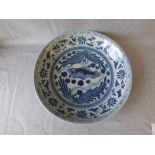 Late C19th charger painted with a fish amidst foliate, twin concentric blue ring marks to base, 41cm