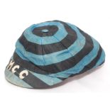 Early cricket cap, c1900. An original silk cricket cap with black and blue hoops and small peak