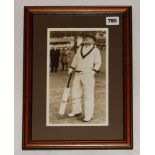 Don Bradman, c1934. Mono reproduction photograph of Bradman, full length in cricket attire and