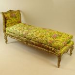 19th Century Italian carved, painted and parcel gilt chaise lounge. Unsigned. Rubbing, surface wear,