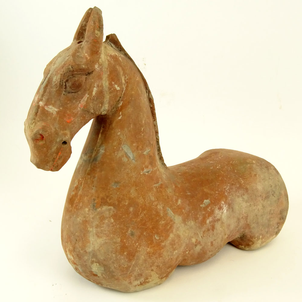 Chinese Han Dynasty Terra Cotta Figure of a Horse with Traces of Pigment. The Gallery Has Been