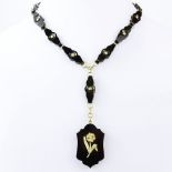 Circa 1890 Victorian 14 Karat Yellow Gold. Black Onyx and Seed Pearl Pendant Necklace. Unsigned.